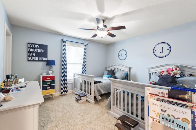 128 Cedar Falls Ct, Columbia, MO 65203 - carpeted bedroom with a ceiling fan and baseboards