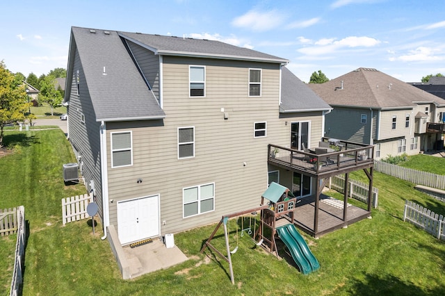 128 Cedar Falls Ct, Columbia, MO 65203 - rear view of property featuring a deck, a patio, a shingled roof, and a playground