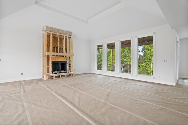 7200 Rudchester Ct, Columbia, MO 65203 - unfurnished living room featuring baseboards, a towering ceiling, and a large fireplace