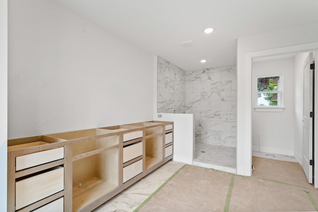 7200 Rudchester Ct, Columbia, MO 65203 - full bath with a marble finish shower, marble look tile flooring, recessed lighting, and baseboards