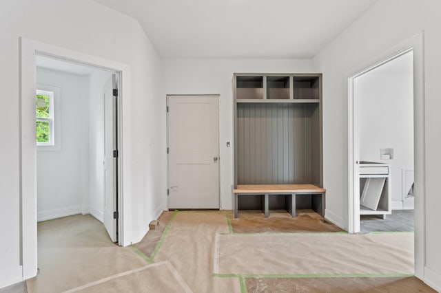 7200 Rudchester Ct, Columbia, MO 65203 - mudroom featuring carpet flooring and baseboards