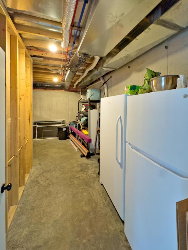 602 E Old Hawthorne Dr, Columbia, MO 65201 - unfinished basement featuring freestanding refrigerator