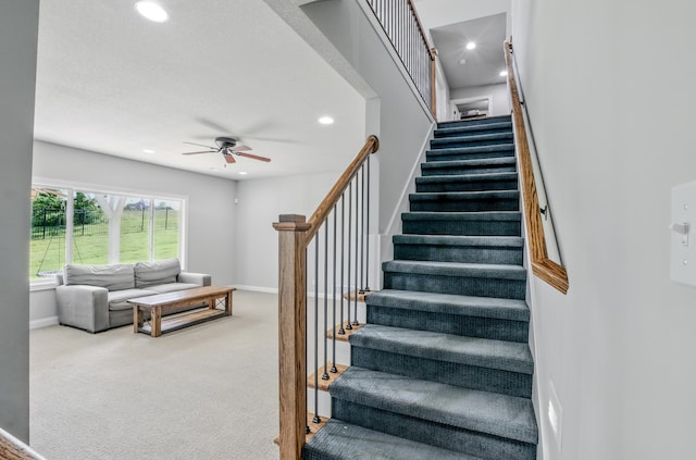 602 E Old Hawthorne Dr, Columbia, MO 65201 - stairway with carpet flooring, a ceiling fan, recessed lighting, and baseboards