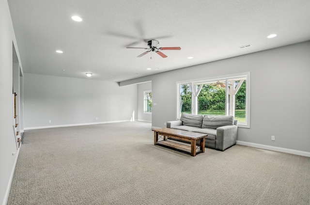 602 E Old Hawthorne Dr, Columbia, MO 65201 - living area with ceiling fan, light colored carpet, recessed lighting, and baseboards