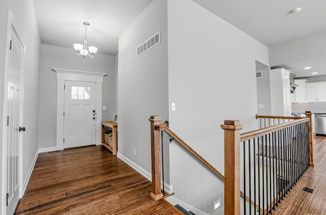 602 E Old Hawthorne Dr, Columbia, MO 65201 - entryway with wood finished floors, a chandelier, baseboards, and recessed lighting