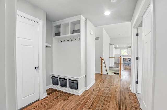 602 E Old Hawthorne Dr, Columbia, MO 65201 - mudroom featuring wood finished floors, baseboards, and recessed lighting