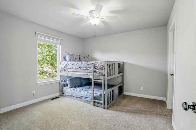 602 E Old Hawthorne Dr, Columbia, MO 65201 - carpeted bedroom featuring baseboards and a ceiling fan