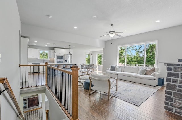 602 E Old Hawthorne Dr, Columbia, MO 65201 - living area featuring recessed lighting, ceiling fan, and wood finished floors