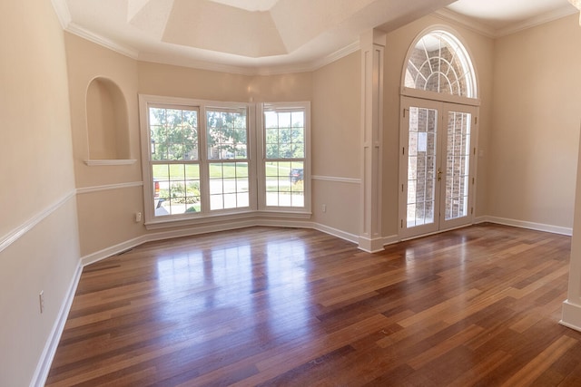 2409 Wild Oak Ct, Columbia, MO 65201 - empty room with dark wood finished floors, french doors, and crown molding