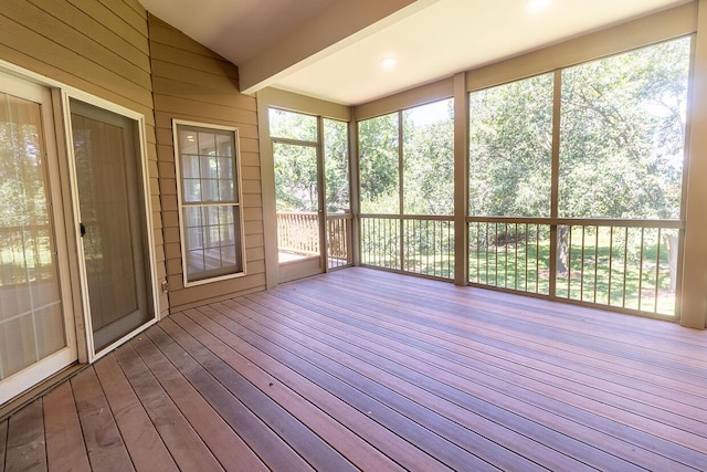 2409 Wild Oak Ct, Columbia, MO 65201 - unfurnished sunroom featuring vaulted ceiling, a deck, wood-type flooring, and wooden walls
