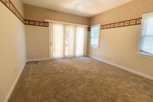 2409 Wild Oak Ct, Columbia, MO 65201 - carpeted spare room with healthy amount of natural light