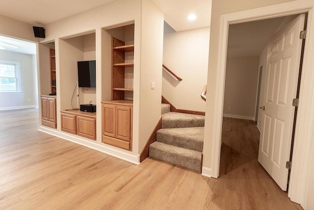 2409 Wild Oak Ct, Columbia, MO 65201 - stairway featuring wood finished floors and built in features