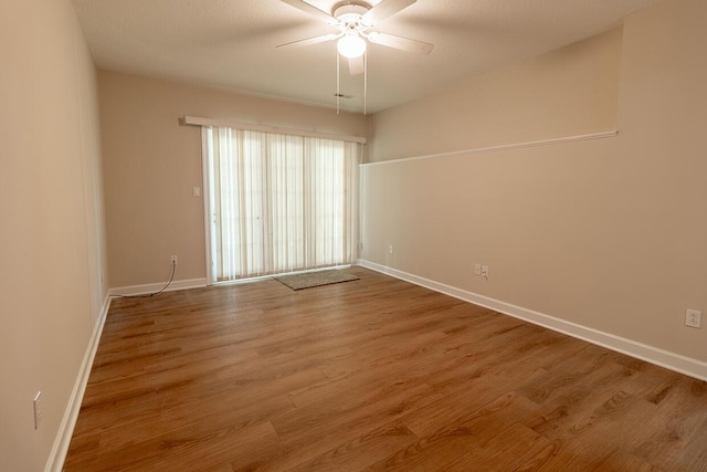 2409 Wild Oak Ct, Columbia, MO 65201 - empty room featuring a ceiling fan and wood finished floors