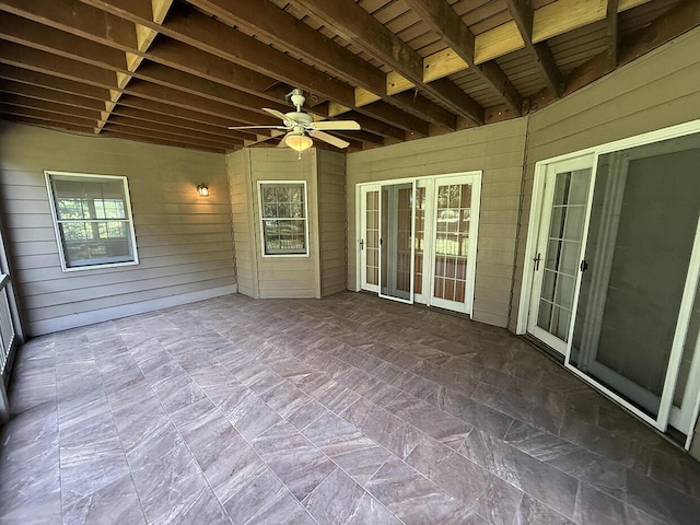 2409 Wild Oak Ct, Columbia, MO 65201 - unfurnished sunroom with a ceiling fan