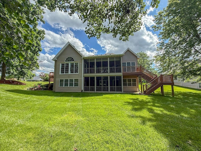 2409 Wild Oak Ct, Columbia, MO 65201 - rear view of house featuring a sunroom, a yard, and stairway