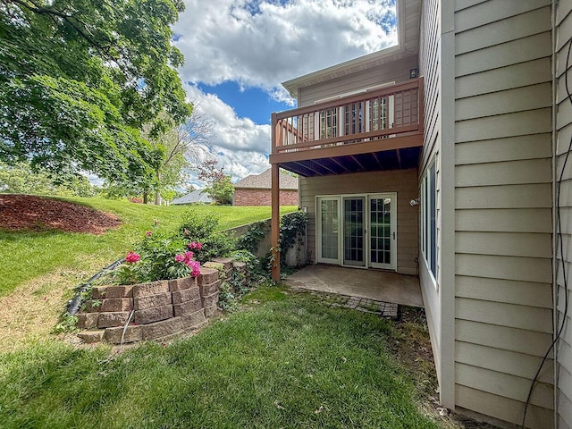 2409 Wild Oak Ct, Columbia, MO 65201 - view of grassy yard with a patio and french doors