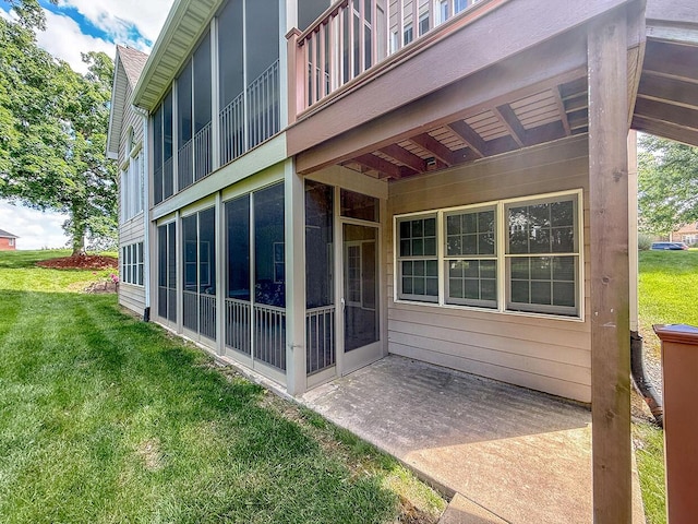 2409 Wild Oak Ct, Columbia, MO 65201 - view of home's exterior with a lawn and a patio