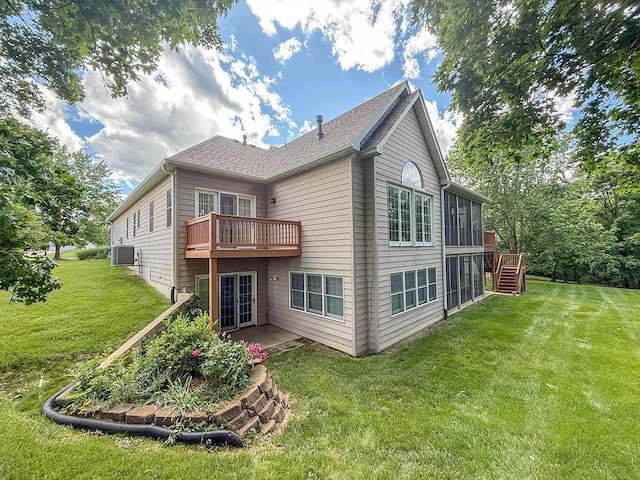 2409 Wild Oak Ct, Columbia, MO 65201 - rear view of property with a yard, stairway, a wooden deck, and a patio area