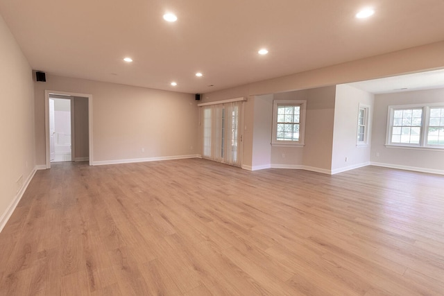 2409 Wild Oak Ct, Columbia, MO 65201 - spare room featuring recessed lighting, light wood-type flooring, and plenty of natural light