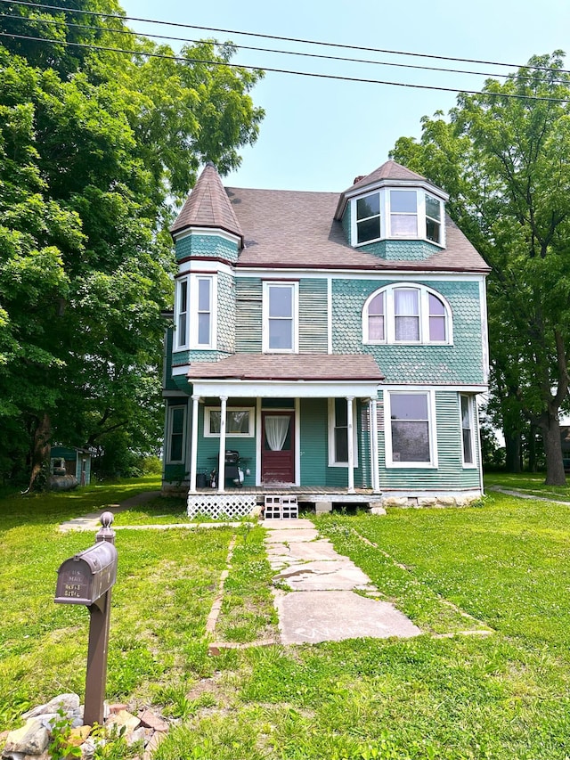 408 Vassar St, Bunceton, MO 65237 - victorian-style house with covered porch and a front yard