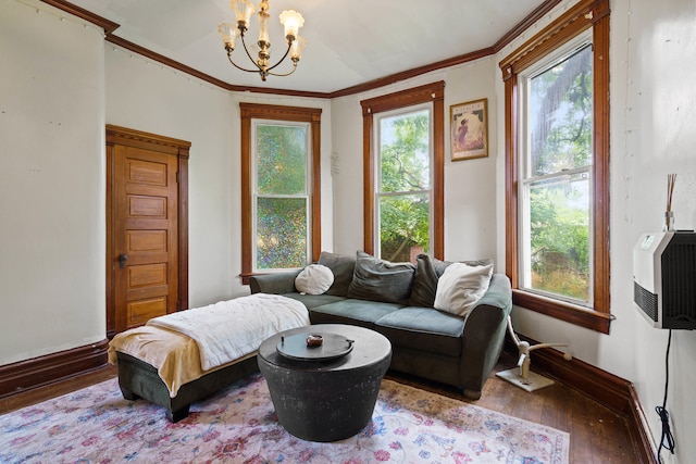408 Vassar St, Bunceton, MO 65237 - bedroom featuring wood finished floors, a chandelier, and ornamental molding