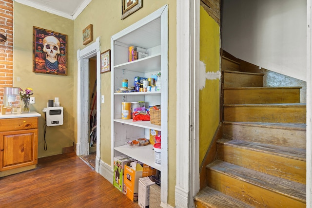 408 Vassar St, Bunceton, MO 65237 - staircase with wood finished floors and crown molding