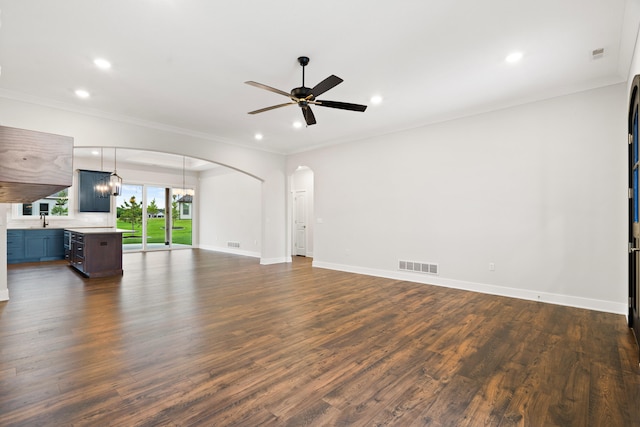 6505 Cromford Ln, Columbia, MO 65201 - unfurnished living room featuring recessed lighting, ceiling fan, a sink, dark wood-style flooring, and ornamental molding