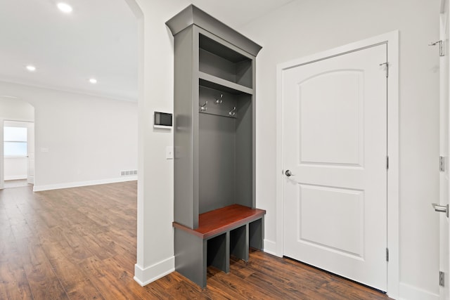 6505 Cromford Ln, Columbia, MO 65201 - mudroom featuring arched walkways, dark wood-style floors, baseboards, and recessed lighting