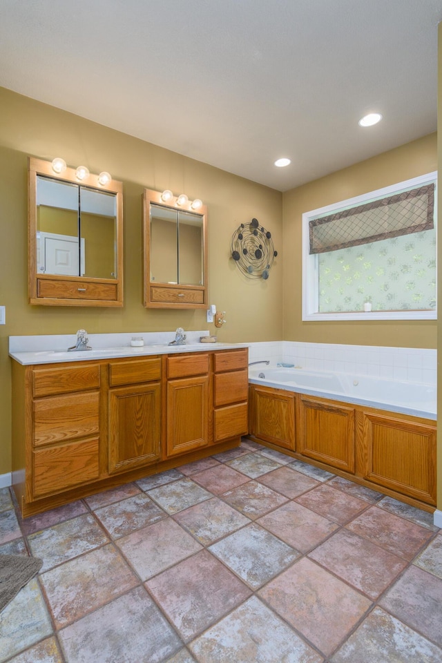 3111 E E W Snowy Hills Ln, Hartsburg, MO 65039 - full bathroom with a garden tub, double vanity, and stone finish flooring