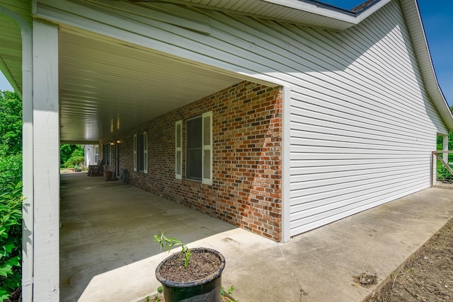 3111 E E W Snowy Hills Ln, Hartsburg, MO 65039 - view of side of home featuring brick siding