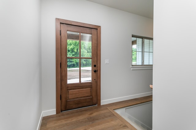 4000 S Felicity Ln, Columbia, MO 65203 - doorway with baseboards and wood finished floors