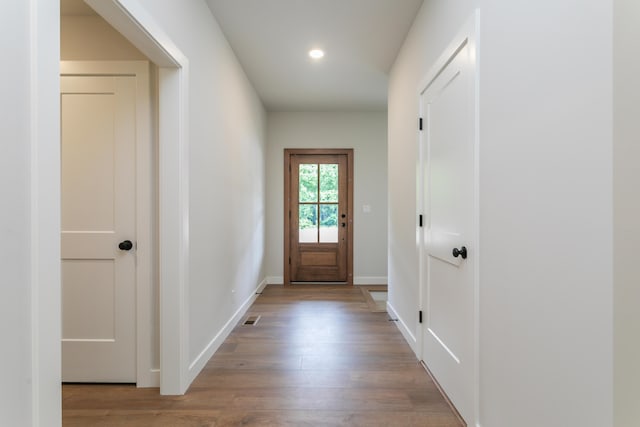 4000 S Felicity Ln, Columbia, MO 65203 - doorway to outside featuring wood finished floors, recessed lighting, and baseboards