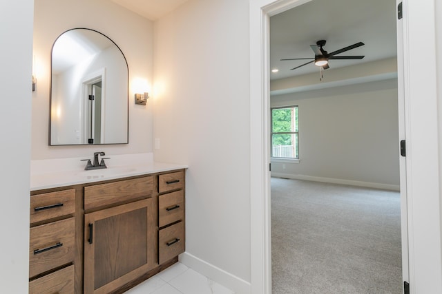 4000 S Felicity Ln, Columbia, MO 65203 - bathroom with vanity, a ceiling fan, and baseboards
