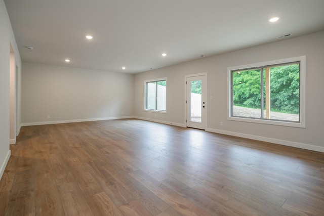 4000 S Felicity Ln, Columbia, MO 65203 - empty room featuring wood finished floors, baseboards, and recessed lighting