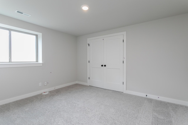 4000 S Felicity Ln, Columbia, MO 65203 - unfurnished bedroom featuring carpet floors, baseboards, and a closet
