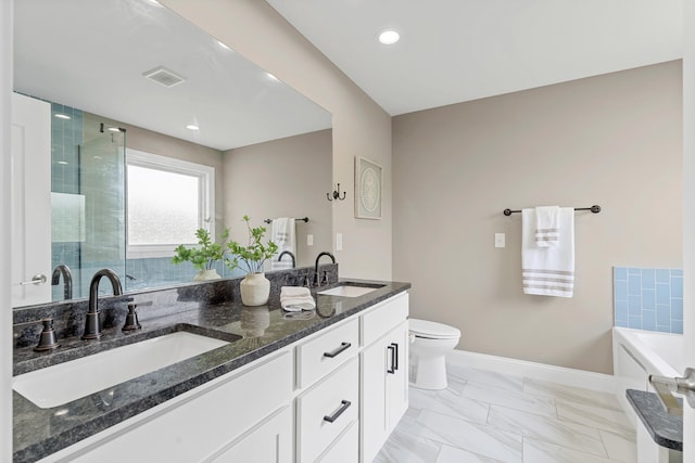 5990 W Tamarack Dr, Columbia, MO 65203 - full bathroom featuring double vanity, a shower stall, a garden tub, and marble finish flooring