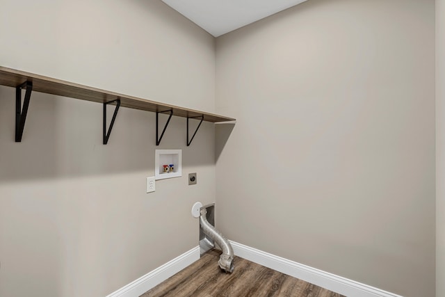 5990 W Tamarack Dr, Columbia, MO 65203 - laundry room with electric dryer hookup, wood finished floors, and washer hookup