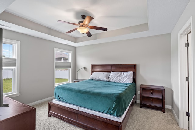 4841 Valley Forge Cir, Ashland, MO 65010 - bedroom with carpet, a tray ceiling, baseboards, and ceiling fan