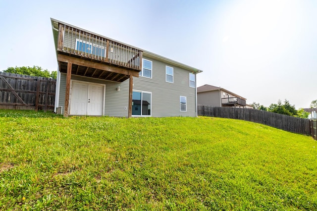 5506 Murfreesboro Dr, Columbia, MO 65201 - back of property featuring a wooden deck