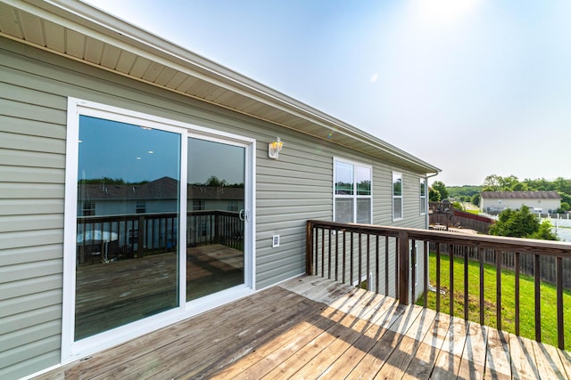 5506 Murfreesboro Dr, Columbia, MO 65201 - wooden deck featuring a lawn