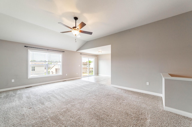 5506 Murfreesboro Dr, Columbia, MO 65201 - carpeted empty room with a ceiling fan, baseboards, and vaulted ceiling