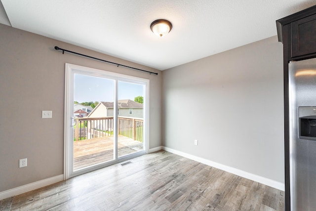 5506 Murfreesboro Dr, Columbia, MO 65201 - unfurnished dining area featuring light wood-type flooring and baseboards