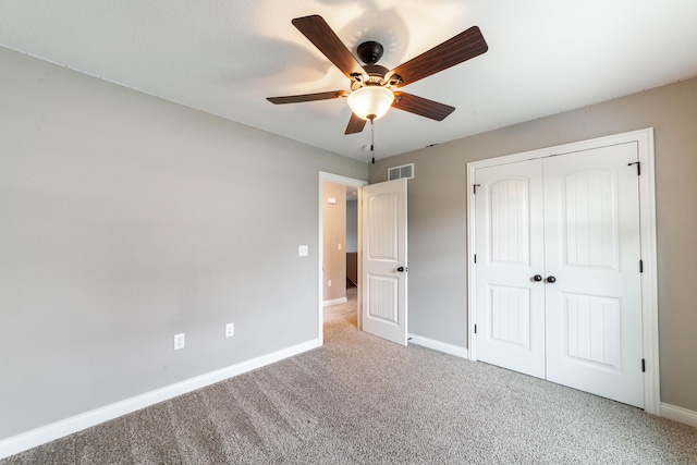 5506 Murfreesboro Dr, Columbia, MO 65201 - unfurnished bedroom with carpet floors, baseboards, a closet, and ceiling fan