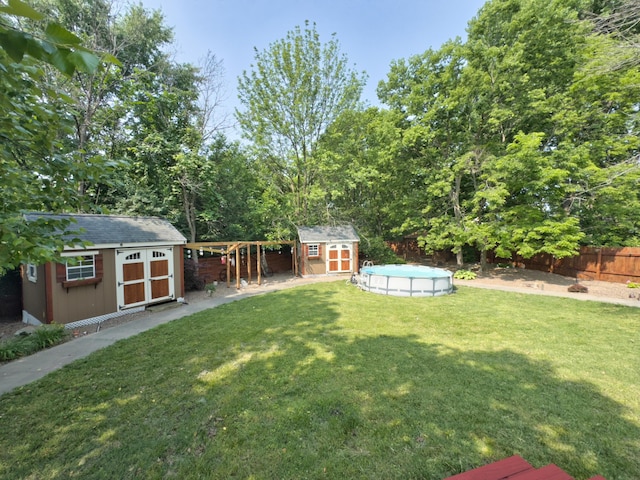 1402 Jean Rae Dr, Columbia, MO 65203 - view of yard with an outdoor pool