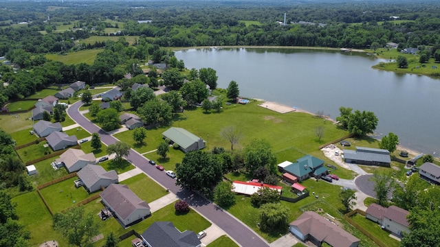 7901 N Chesley Dr, Columbia, MO 65202 - aerial view of residential area featuring a forest and a nearby body of water