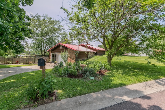 7901 N Chesley Dr, Columbia, MO 65202 - view of home's exterior featuring brick siding and concrete driveway