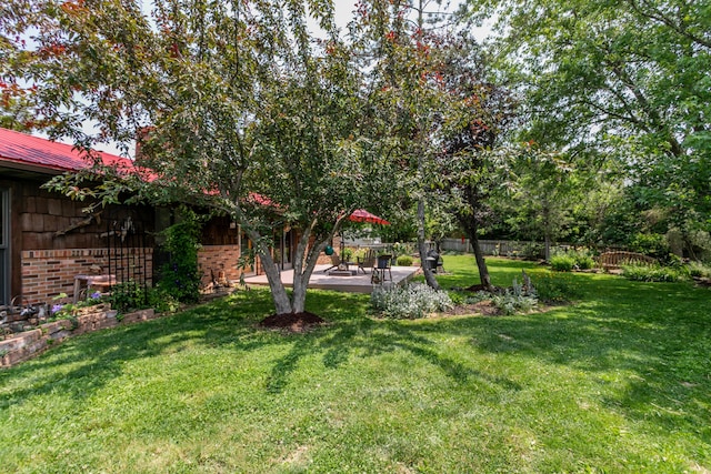 7901 N Chesley Dr, Columbia, MO 65202 - view of yard featuring a patio