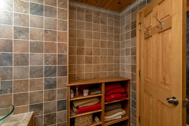 7901 N Chesley Dr, Columbia, MO 65202 - bathroom featuring tile walls and wooden ceiling