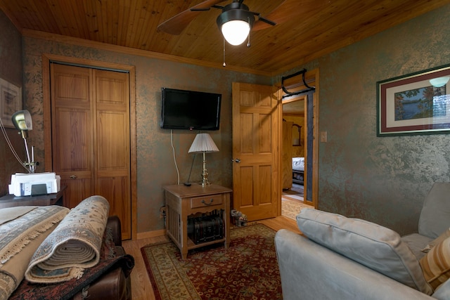 7901 N Chesley Dr, Columbia, MO 65202 - living room with light wood-type flooring, a ceiling fan, wood ceiling, crown molding, and wallpapered walls