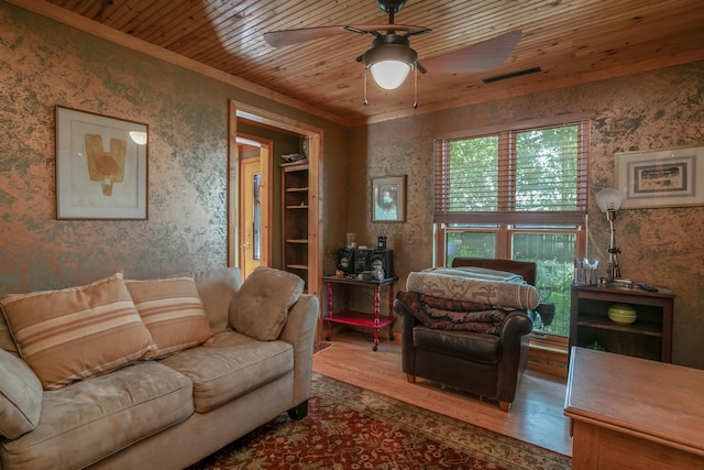 7901 N Chesley Dr, Columbia, MO 65202 - living room featuring wood finished floors, wooden ceiling, and a ceiling fan